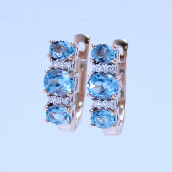 Серьги из красного золота с топазами и бриллиантами